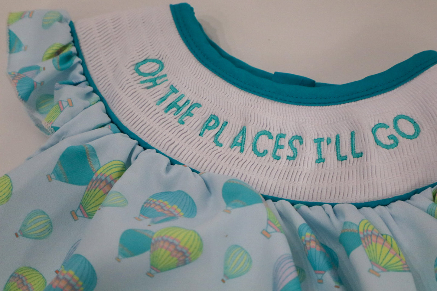 Adventure Awaits Baby Girl Bubble – Smocked Ruffle Bubble